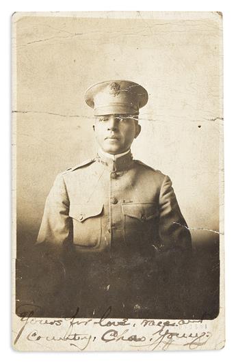 (MILITARY.) Charles Young. Warm personal letter and signed photo postcard by Americas first Black colonel.